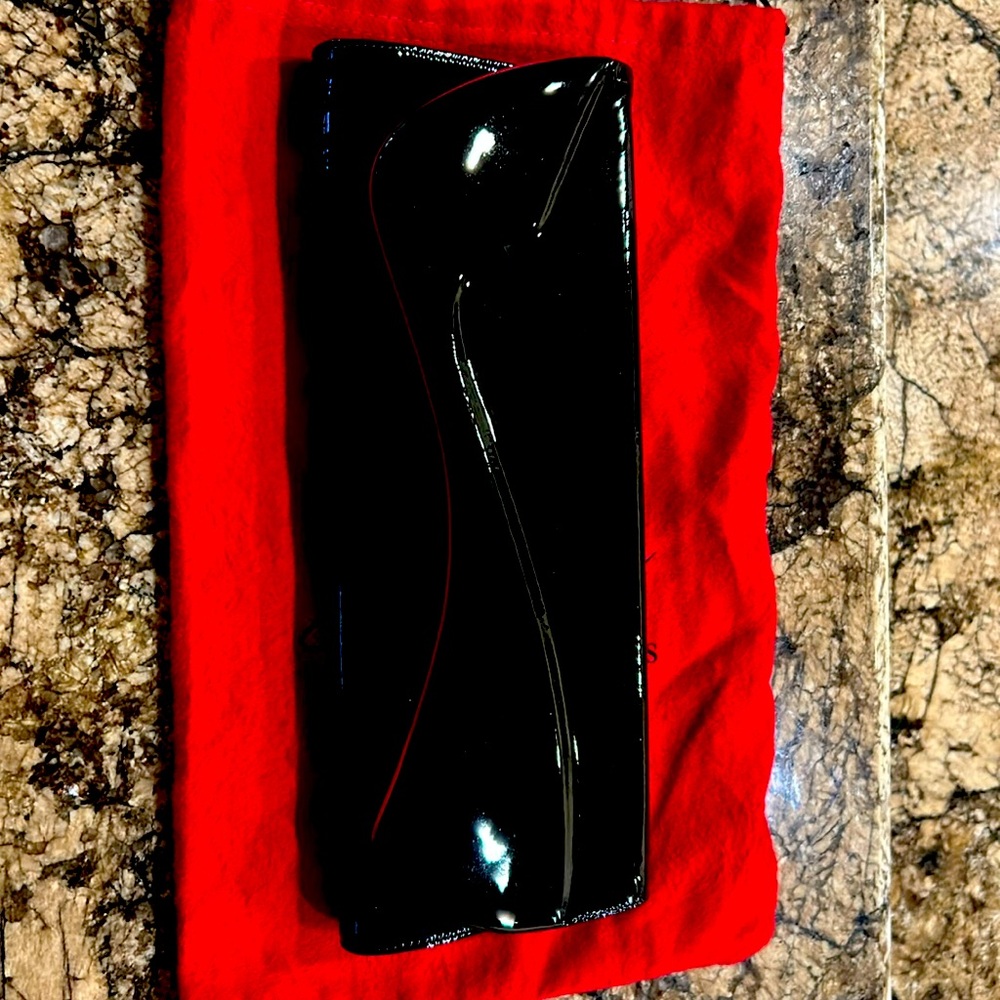 Christian louboutin black patent leather
Used once
Tags still present